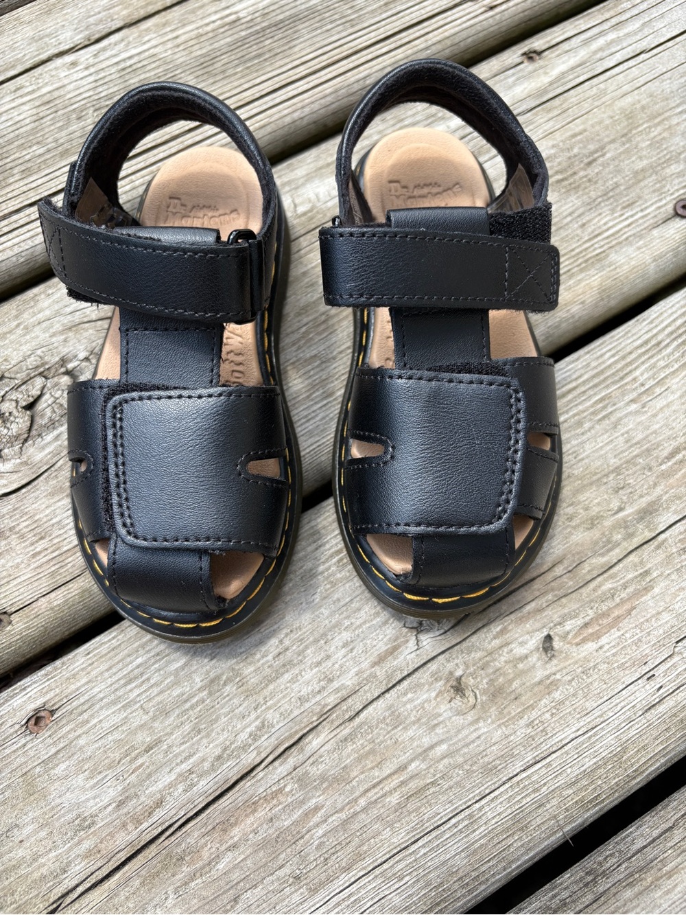 Dr. Martens Kids Black Leather Hook-and-Loop Sandals with Yellow Stitching